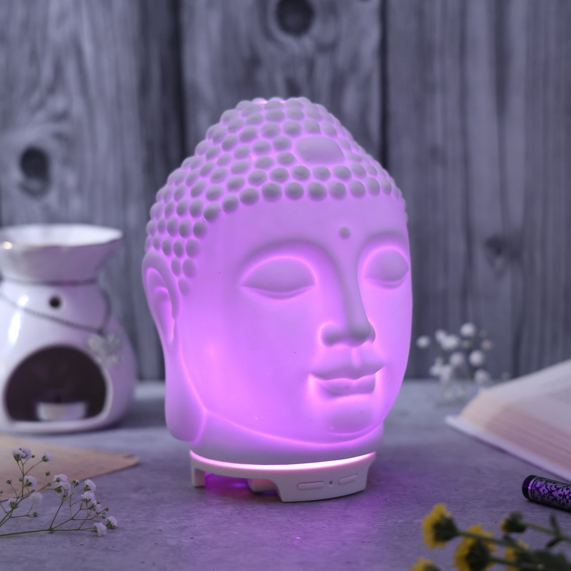 IRIS Celeste Buddha Ceramic Ultrasonic Aroma Diffuser lifestyle Background with light